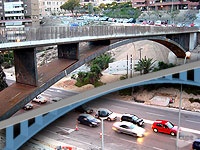 Footbridge access to shopping centre, crossing the N-320 in Alicante (Spain)